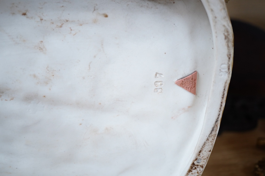 A large Royal Dux porcelain group of a pair oxen with a farm hand, pink triangle mark. 38cm wide
